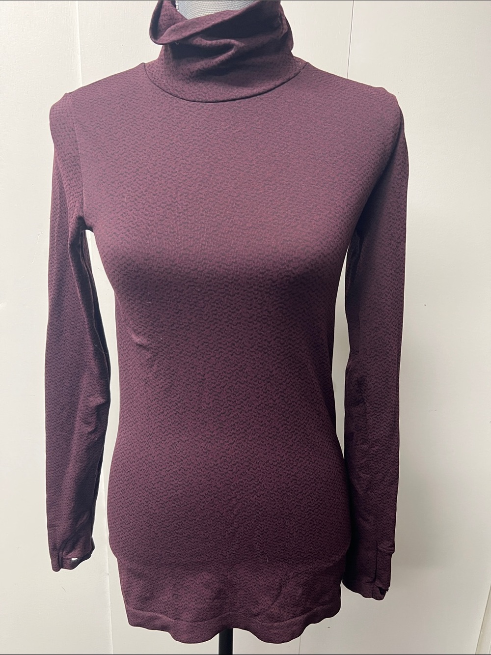 Athleta Long Sleeve Turtleneck Top in Plum and Black.